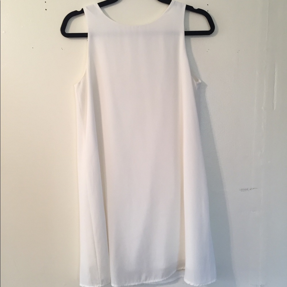White shift dress with bow backing